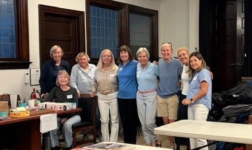 Volunteers gather during the Christ Child Society of Summit’s annual School Supplies Drive.