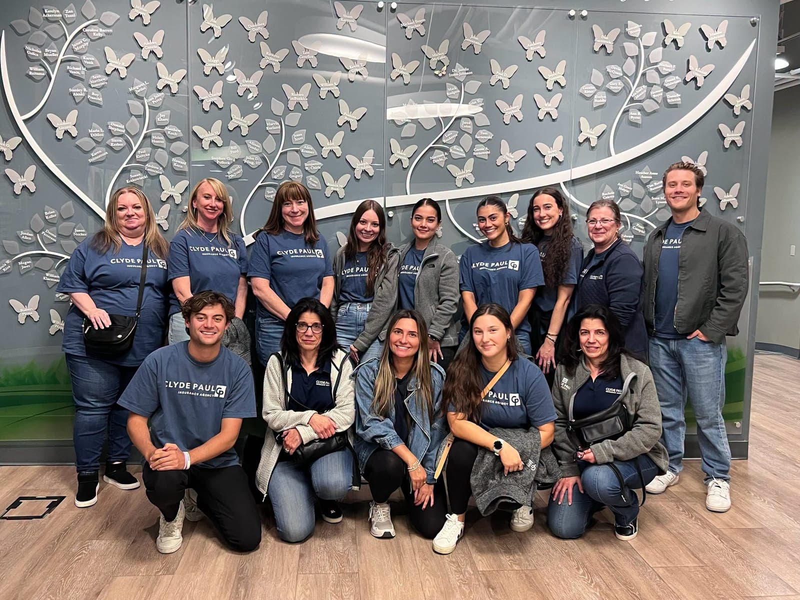 Employees of Clyde Paul Agency, Inc.’s Summit and New Providence locations joined forces at NJ Sharing Network’s headquarters in New Providence to support organ and tissue donor families through the Wrapped in Love program.