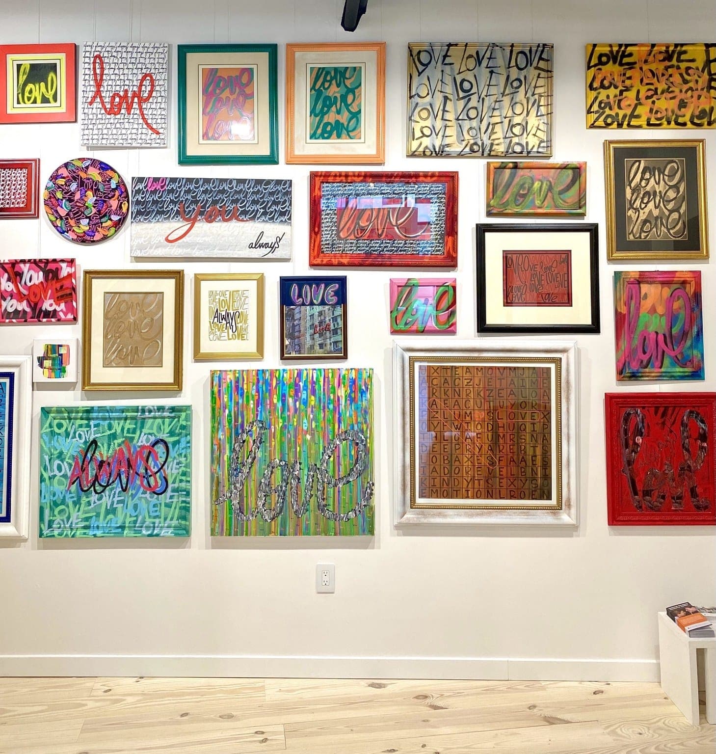 Works from the charity collection filled the gallery’s Love Wall.